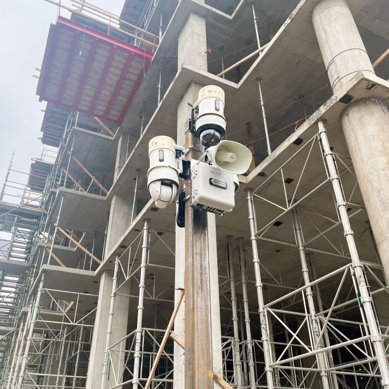 Two Pole Cameras and Horn Speaker on Jobsite