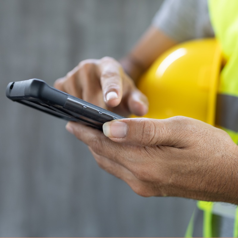 Construction Worker Using Phone
