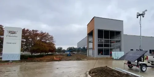 Blog Thumbnail Wide Solar Trailer outside Cadillac's new dealership being constructed