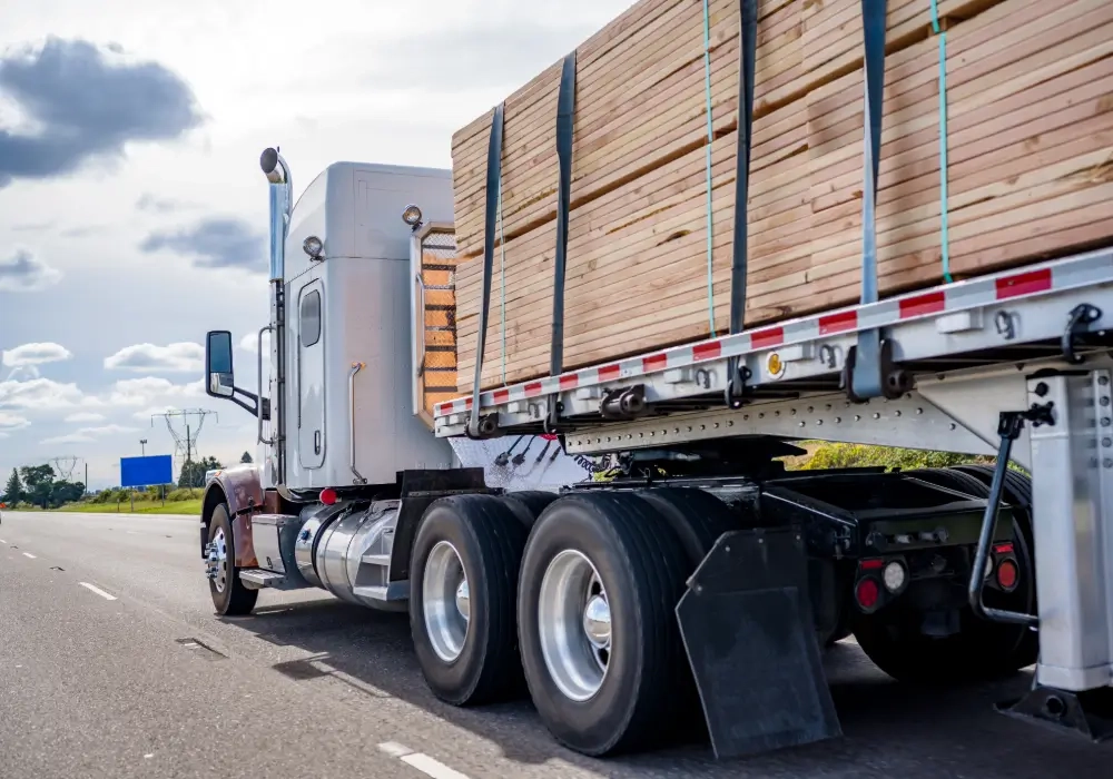 timber on the back of a lorry